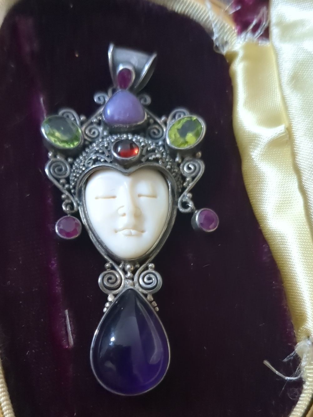 Sterling Silver Carved Goddess Pendant with Purple and Green Gem Accents